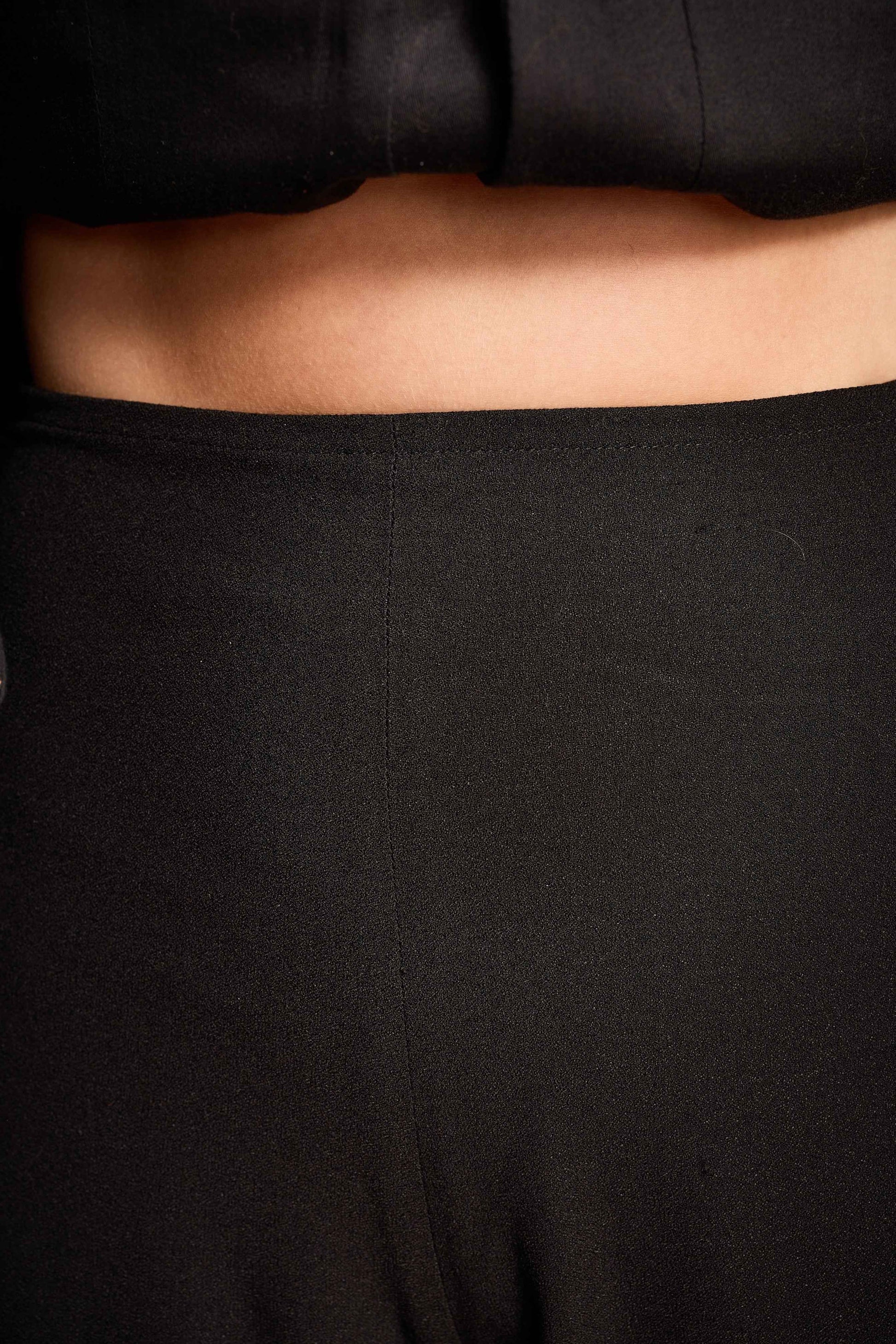Yves Saint Laurent 1990s Black Crepe Swing Pants